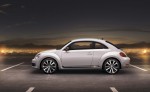 2012-Volkswagen-Beetle-exterior-from-side-in-white1