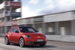 2012-Volkswagen-Beetle-in-red,-exterior-in-motion