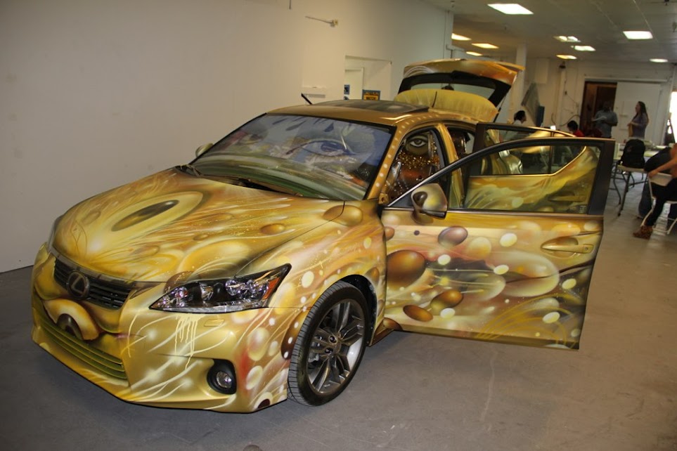 Artist Represents Lexus' Moving Expressions CT200h at Self Help Graphics . Sounds like a Ferrari, Costs way less.