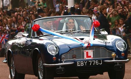 Prince William and Catherine Drive by in vintage Aston Martin DB6 Volante MK II