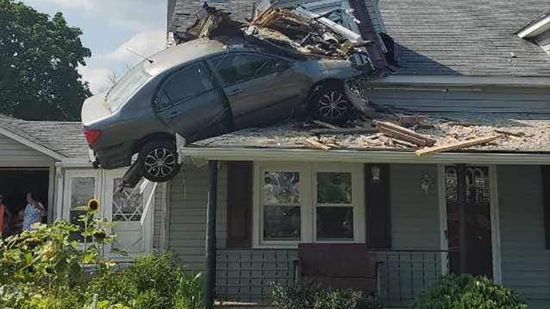 Driver Goes Full-Send with Toyota Corolla Crashing into Top of House