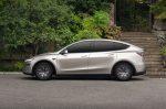 tesla model y l side